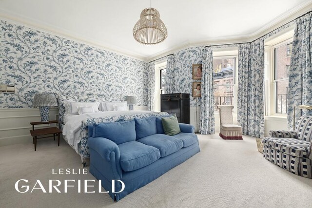 159 E 71st St, New York City, NY 10021 - bedroom featuring wallpapered walls, ornamental molding, and carpet