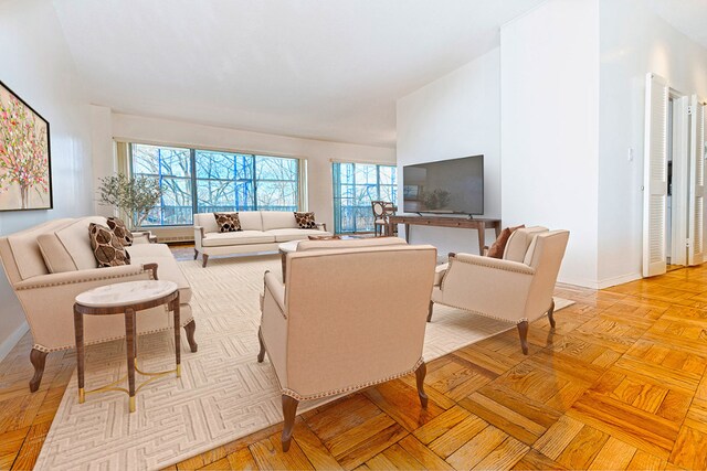 living room featuring light parquet floors