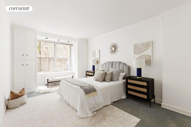 bedroom with dark carpet