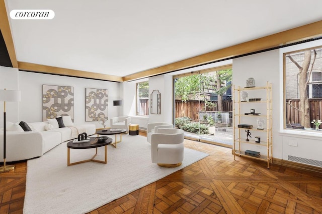 living room featuring parquet flooring