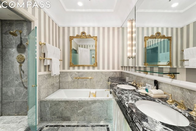 bathroom featuring vanity, crown molding, and independent shower and bath