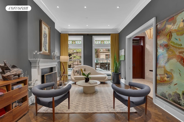 living area with a fireplace, crown molding, and recessed lighting