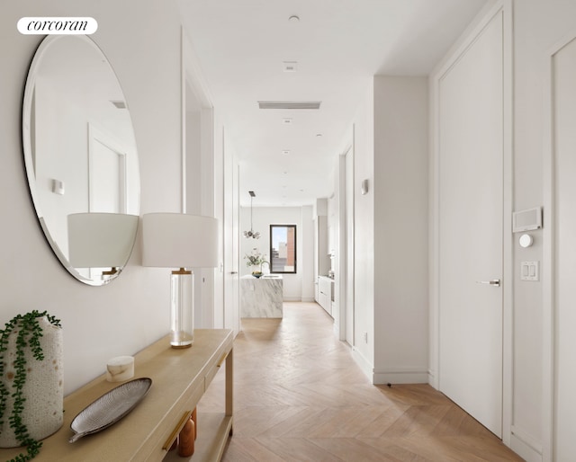 hall featuring light parquet floors