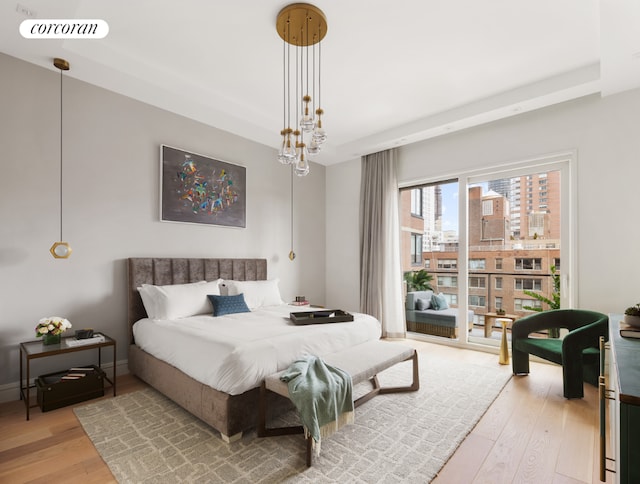 bedroom with light hardwood / wood-style floors