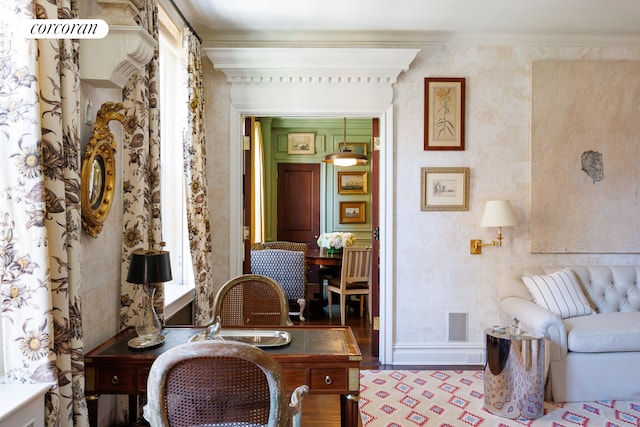 office with crown molding and wood finished floors