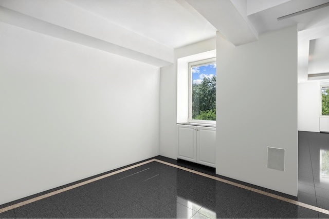860 5th Ave Unit 7B, New York City, NY 10065 - unfurnished room with granite tiled floors and inlaid floor details