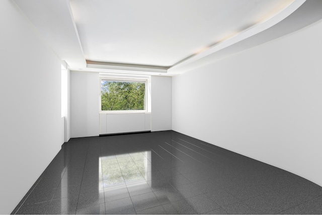 860 5th Ave Unit 7B, New York City, NY 10065 - unfurnished room with a raised ceiling