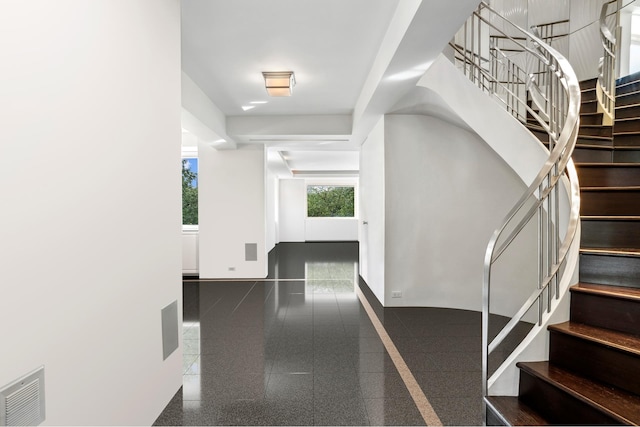 860 5th Ave Unit 7B, New York City, NY 10065 - stairs featuring granite floors and baseboards