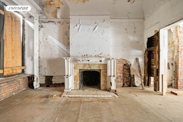 872 Park Place, New York City, NY 11216 - unfurnished living room featuring a fireplace with raised hearth