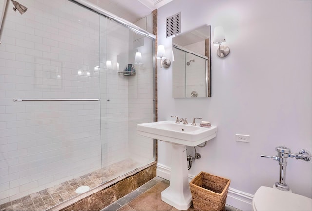 955 5th Ave Unit 2B, New York City, NY 10075 - full bathroom featuring a shower stall, toilet, and baseboards