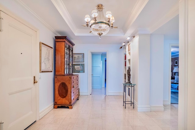 955 5th Ave Unit 2B, New York City, NY 10075 - hall with a chandelier, baseboards, ornamental molding, and a raised ceiling