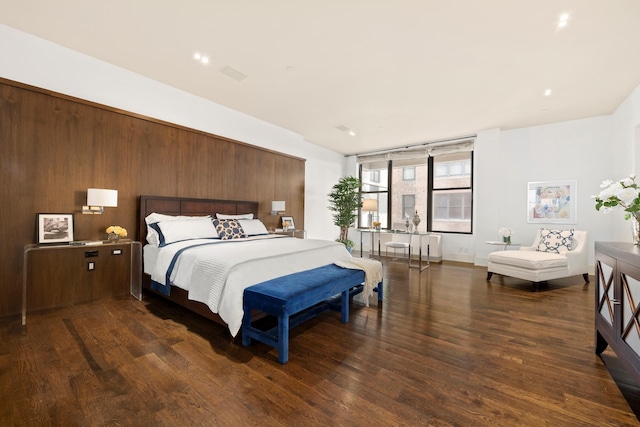 bedroom featuring wood finished floors
