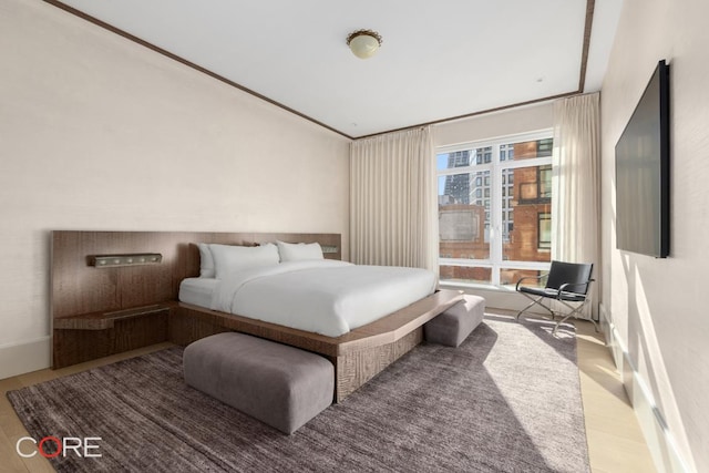 bedroom featuring hardwood / wood-style flooring