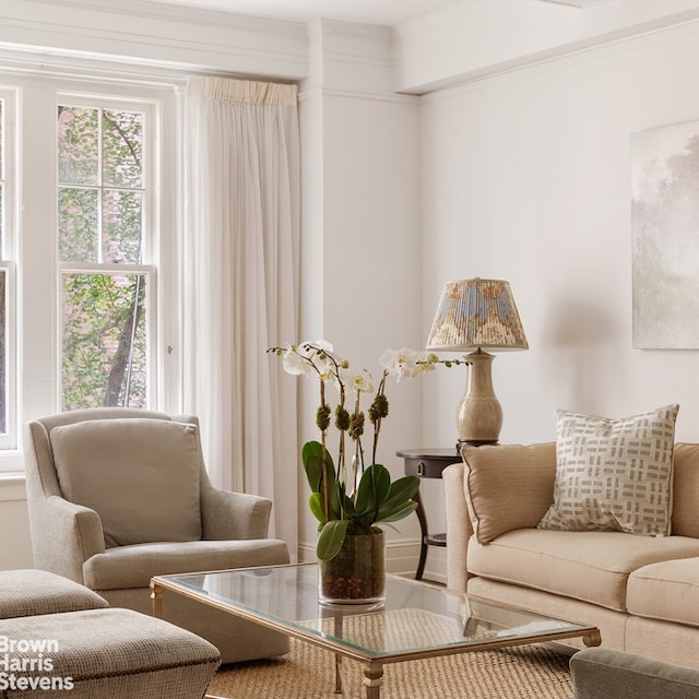 sitting room with ornamental molding