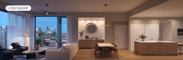 interior space featuring light wood-type flooring, visible vents, and a city view