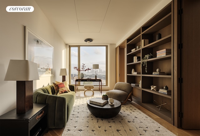 sitting room with visible vents and dark wood-style flooring