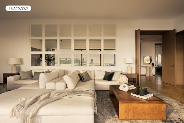 sitting room featuring hardwood / wood-style floors and a wall of windows