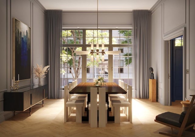 dining area with an inviting chandelier