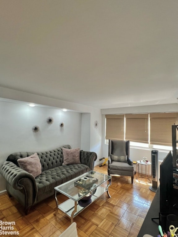 living room featuring light parquet flooring