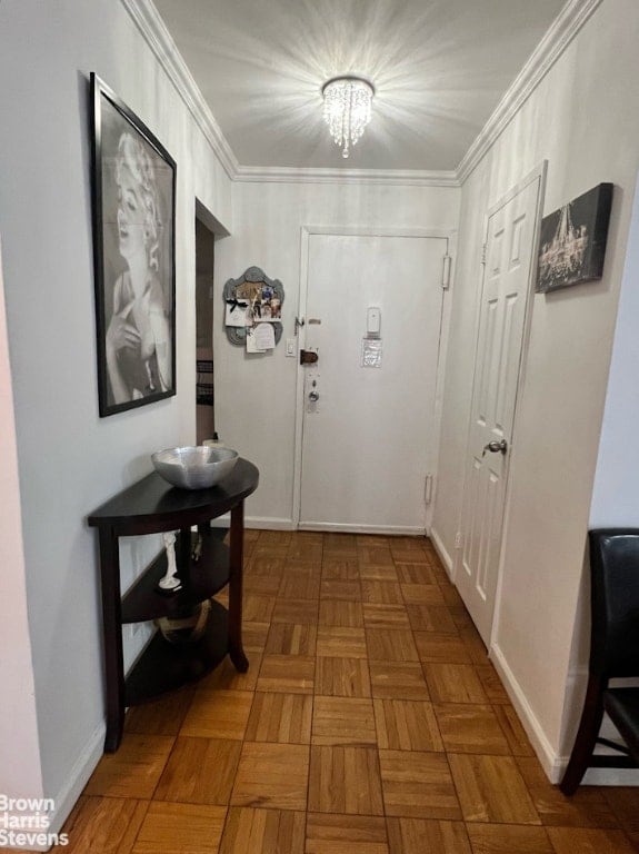 hall featuring dark parquet flooring and crown molding