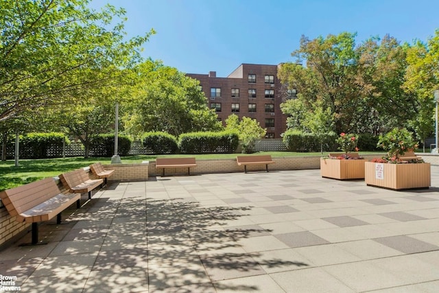 surrounding community featuring a patio area