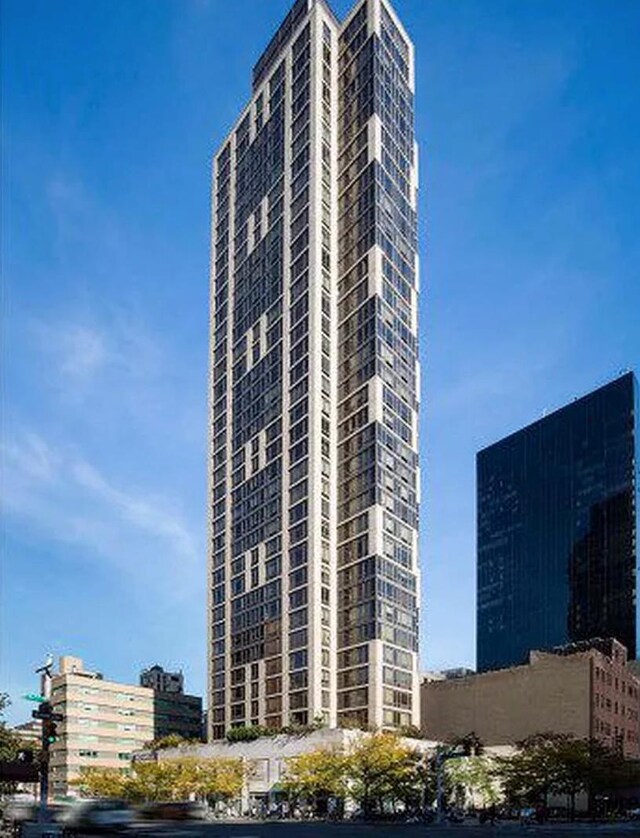 401 E 60th St Unit 38Ab, New York City, NY 10065 - view of building exterior with a view of city