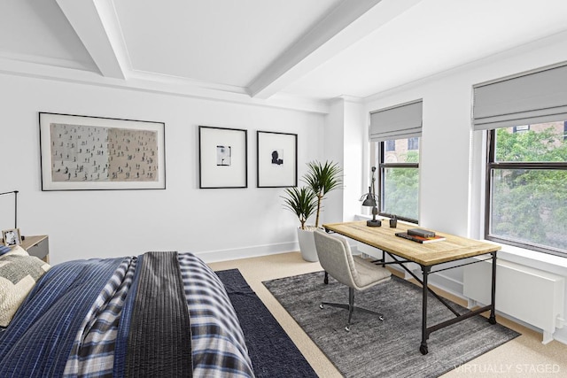 carpeted office with beam ceiling