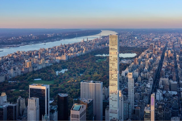 property's view of city featuring a water view