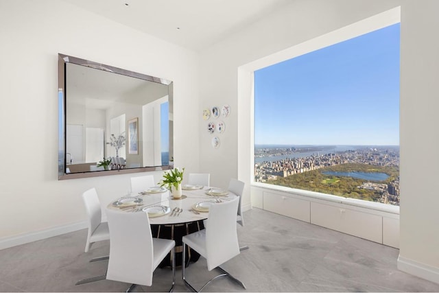 dining space with baseboards