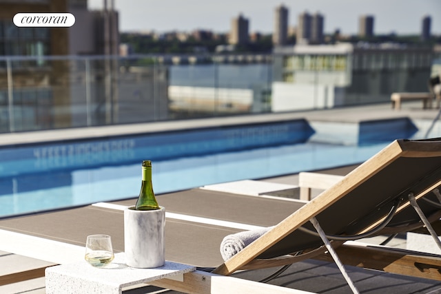 swimming pool with a patio area