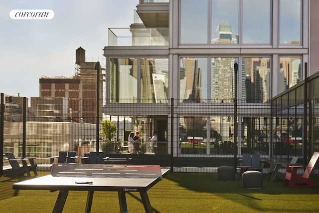 back of property featuring a view of city