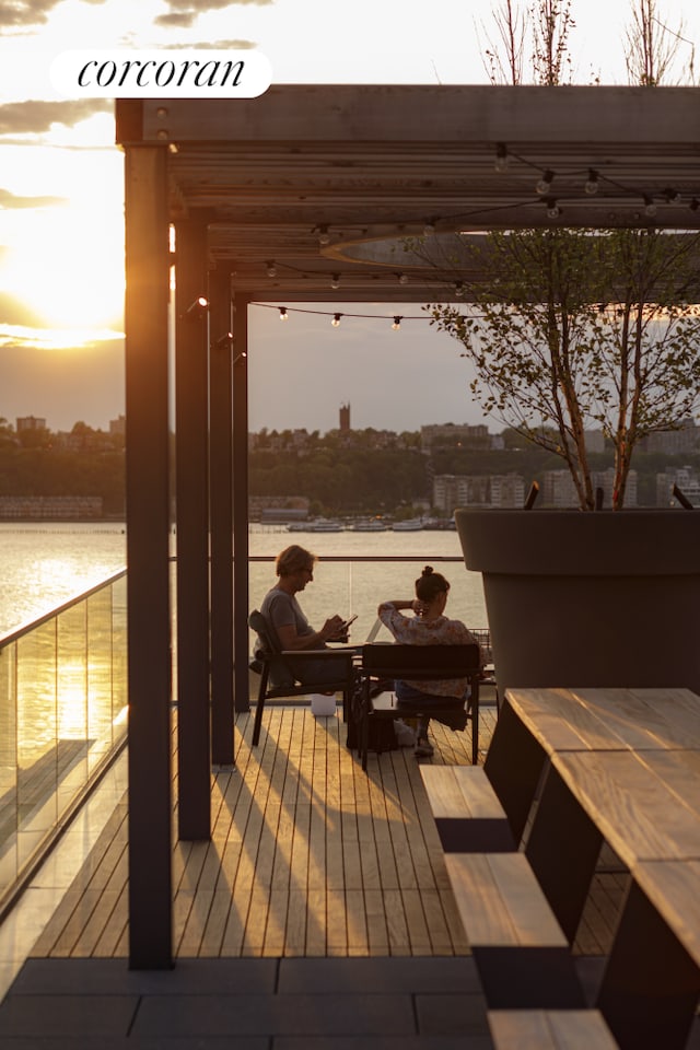 dock area with a deck with water view