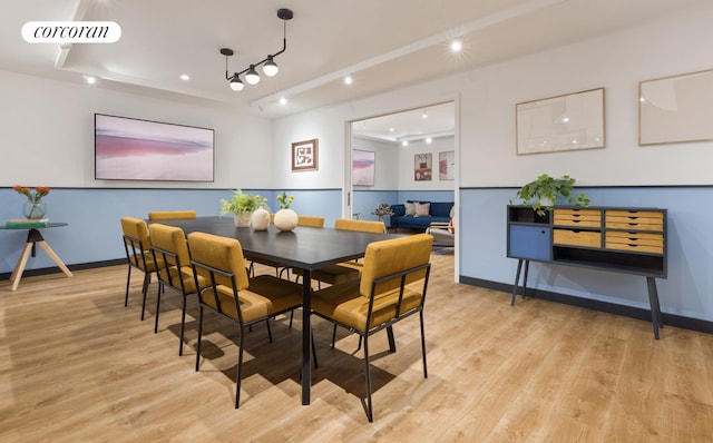 dining room with light wood-type flooring, recessed lighting, and baseboards