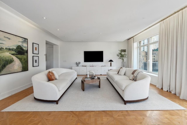 living room with light parquet floors