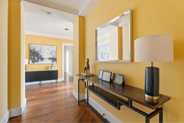 hallway with crown molding and parquet floors