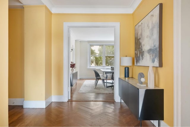 corridor with parquet floors and ornamental molding