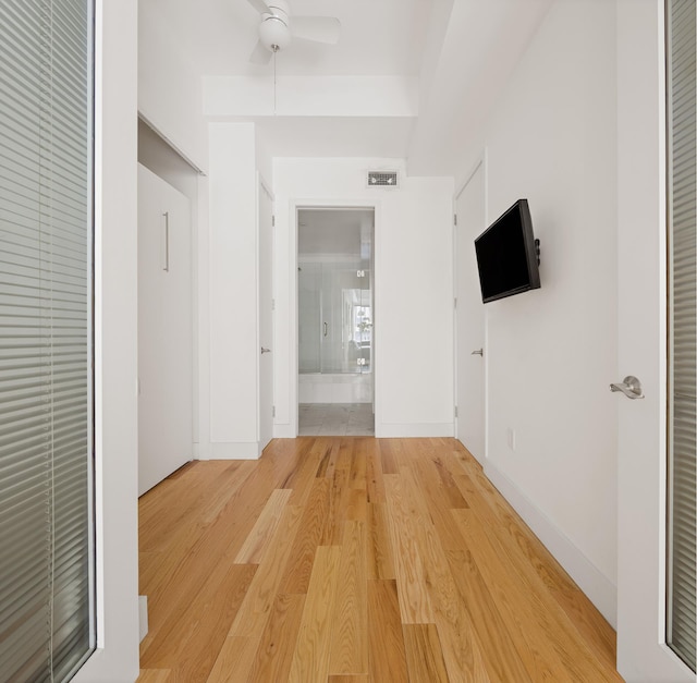 315 7th Ave Unit 3D, New York City, NY 10001 - corridor with light wood finished floors and baseboards