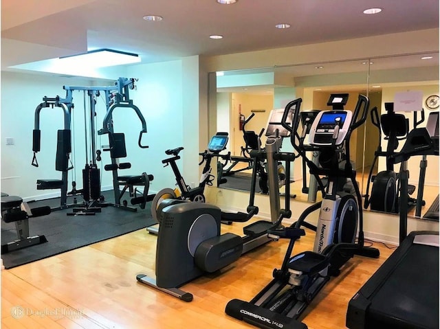 233 E 70th St Unit 10T, New York City, NY 10021 - exercise room with wood finished floors and recessed lighting