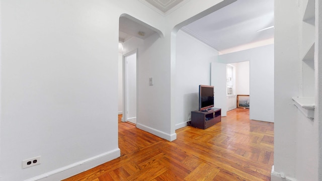 2191 Bolton St Unit 5E, New York City, NY 10462 - hallway with arched walkways, baseboards, and ornamental molding