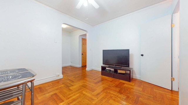 2191 Bolton St Unit 5E, New York City, NY 10462 - living room with baseboards, arched walkways, ornamental molding, and a ceiling fan