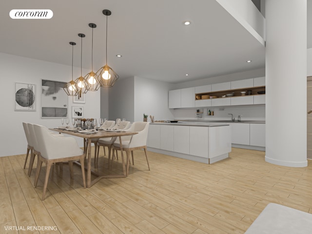 dining area featuring light wood-type flooring