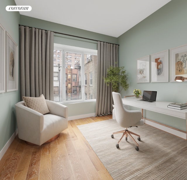 office area with light hardwood / wood-style flooring