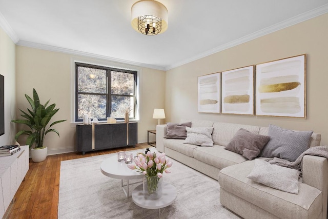 living room with ornamental molding and hardwood / wood-style flooring