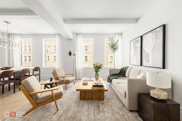 interior space featuring baseboards and an inviting chandelier