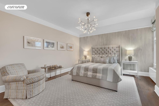 bedroom featuring a chandelier, crown molding, and dark hardwood / wood-style floors