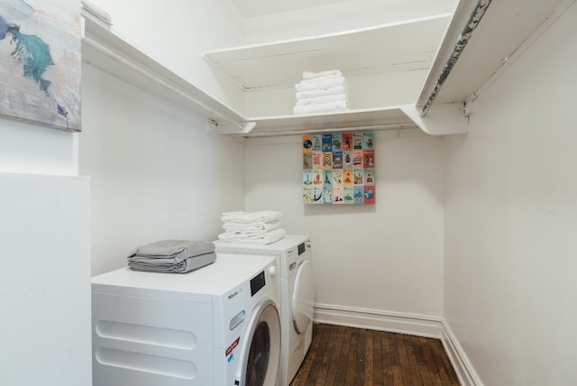 laundry room featuring independent washer and dryer and dark hardwood / wood-style floors