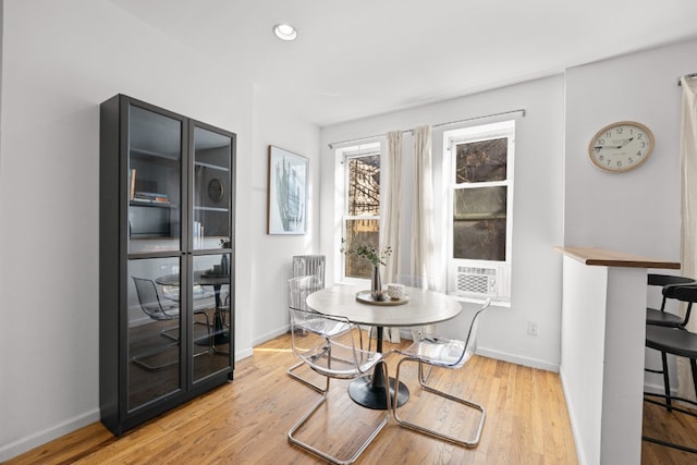 dining area with light wood-type flooring