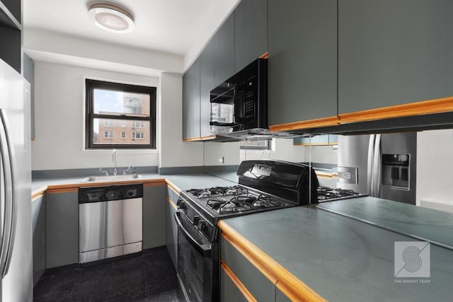 kitchen with black appliances and sink