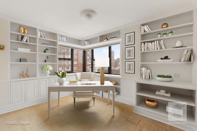 office area featuring ornamental molding, built in features, and light parquet flooring