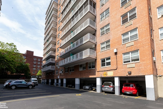 view of property with covered parking